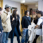 students talking in the hallway